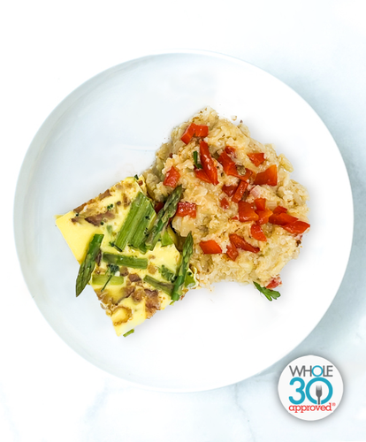 A plate of Bacon And Asparagus Frittata with Pimento Cheese "Grits"
