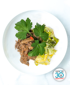 A plate of Barbacoa Beef with Broccoli Squash Casserole and Sweet Potato