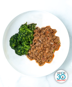 A plate of Beef Bolognese with Garlicky Broccolini