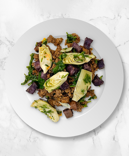 A plate of Beef Chorizo Picadillo Bowl with Spinach, Purple Potatoes and Artichokes