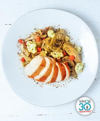 A plate of Grilled Chicken Breast with Artichokes Barigoule