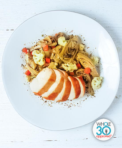 A plate of Roasted Chicken Breast with Artichokes Barigoule