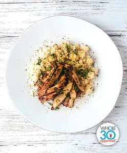 A plate of Jerk Chicken with Pineapple Cauliflower Rice