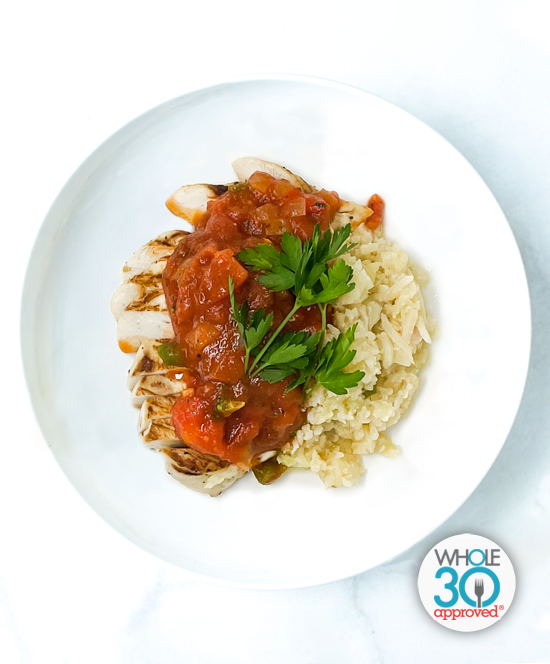 A plate of Chicken Cacciatore With Cauliflower Risotto