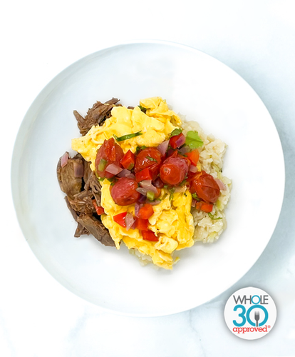 Beef Barbacoa and Scrambled Eggs With Grits And Roasted Pico De Gallo